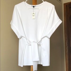 New with tags, never worn. Express white blouse.